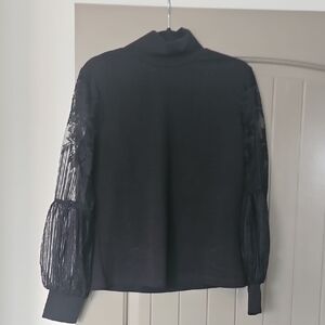 Elegant Black Blouse with Lace Sleeves